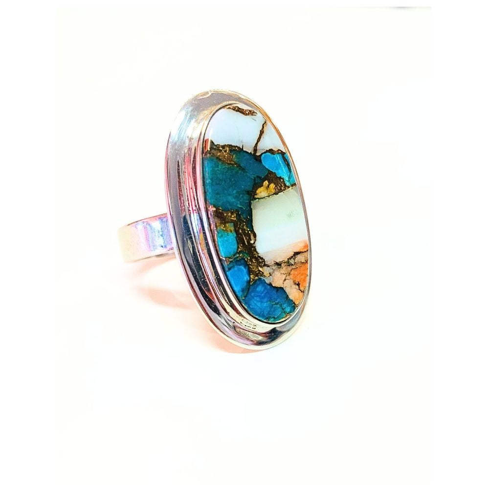 Bague Névada Copper Turquoise et Argent 925 Ovale avec contour en argent sur fond blanc - Protection - Byartmexbijoux
