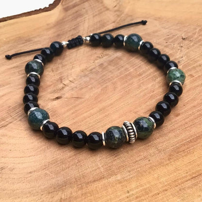 Bracelet homme kambaba onyx argent 925 byartmexbijouxAvec son design simple et élégant, ce bracelet en Kambaba et Onyx est un accessoire polyvalent qui s’intègre parfaitement à votre style, que vous soyez en tenue décontractée ou lors d’occasions plus formelles.